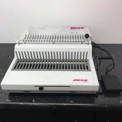 CLC | A Refurbished Renz Combi E Plastic Comb Binding Machine sitting on top of a table.